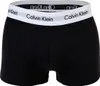 A pair of black Calvin Klein boxer shorts laid flat against a white background. Podgląd zdjęcia produktu