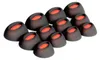 A collection of black silicone ear tips with red inner lining, arranged in a staggered pattern on a white background. Náhled obrázku produktu