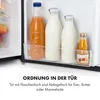 The inside of a refrigerator door with bottles and jars on a shelf. Produktbild-Vorschau