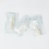 Three small, sealed packets of granular material are arranged on a white background. Náhľad obrázku produktu