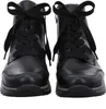A pair of black leather boots with black laces, shown from the front. Anteprima dell’immagine prodotto