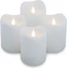 Four white LED candles are arranged in a cluster on a white background. Produktbild-Vorschau