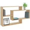 A modern, light wood-colored wall shelf unit with books, a framed picture, and a potted plant. Produktbild-Vorschau