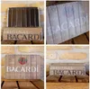 A collage of four images showing a Bacardi storage tin with a wood barrel design. Podgląd zdjęcia produktu