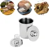 A collage of images showing cooked meat products and a stainless steel meat cooker. Produktbild-Vorschau