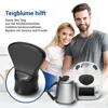 A couple is smiling in the background, with a kitchen appliance and a dough helper in the foreground. Produktbild-Vorschau