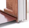 Close-up of a window sill sealing profile attached to a wooden window frame. Náhled obrázku produktu