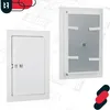 Two white access doors are shown against a blueprint background. The door on the left is closed, and the door on the right is open, revealing a gray interior with mounting brackets. Produktbild-Vorschau