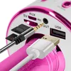 Close-up view of the ports and connectors on a pink karaoke microphone. Produktbild-Vorschau