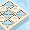A close-up view of a wooden tic-tac-toe game board with blue 'X' pieces and white 'O' pieces. Náhled obrázku produktu