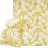 Three folded blankets with a palm leaf pattern. Náhľad obrázku produktu