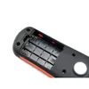 The back of a black and red device with the battery compartment open, showing four battery slots. Náhled obrázku produktu