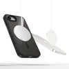 A black and transparent phone case with a silver magnetic charging accessory attached, shown suspended against a white background. Náhled obrázku produktu