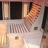Interior view of a wooden sauna with dimensions indicated by white lines and text. Produktbild-Vorschau