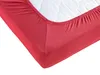 A close-up view of a red fitted sheet on a mattress. Produktbild-Vorschau