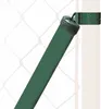 A close-up view of a green metal fence strut attached to a fence post with a clamp. Produktbild-Vorschau