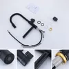 A collage of images showing a black kitchen faucet and its components, along with some accessories and instructions. Produktbild-Vorschau