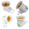 A collage of four white lamp adapters with gold-colored sockets. Náhled obrázku produktu