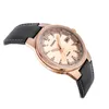 A rose gold Casio watch with a black leather strap is shown against a white background. Podgląd zdjęcia produktu