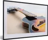 MuchoWow® Gerahmtes Poster Eine E-Gitarre auf einem Produktbild-Vorschau 1