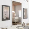 A children's house bed with windows and a small staircase, decorated with a panda plush toy and a moon-shaped light. Produktbild-Vorschau