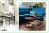 A split image showing a home office setup on the left and a living room with a couch and coffee tables on the right. Produktbild-Vorschau