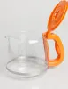 A close-up studio shot of a glass coffee pot with an orange lid and handle. Produktbild-Vorschau