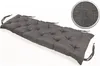 A long, tufted bench cushion on a white background. Produktbild-Vorschau