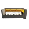 A gray sofa bed with a wooden shelf and LED lighting above the mattress. Náhled obrázku produktu