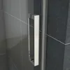 Close-up of a shower door handle against a tiled wall. Produktbild-Vorschau