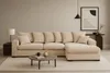 A modern living room scene with a sectional sofa as the main focus. Produktbild-Vorschau
