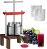 A fruit press with grapes, juice, and filter bags. Náhľad obrázku produktu