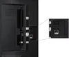 A close-up view of the rear ports of a television, with a magnified inset showing specific connections. Voir les images du produit