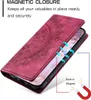 A close-up, angled view of a red flip phone case with a mandala design, showing its magnetic closure feature. Produktbild-Vorschau