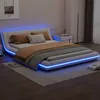 A modern bedroom with a white platform bed featuring blue LED lighting. Náhled obrázku produktu