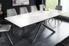 A modern dining room with a marble-patterned extendable dining table and grey chairs. Produktbild-Vorschau
