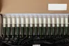 A box of 15 LED candle lights with green bases and white candle-shaped bulbs. Produktbild-Vorschau