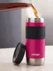 Coffee being poured into a pink Contigo travel mug. Anteprima dell’immagine prodotto