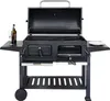 A black charcoal grill with its lid open, placed on a white background. Produktbild-Vorschau