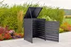 A dark grey garbage bin enclosure with the lid open, situated outdoors on a paved patio next to a flower bed. Náhled obrázku produktu