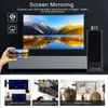 A screen mirroring device is shown connected to a TV, with a smartphone displaying a landscape image being held up to show the mirroring capability. Below are three smaller images illustrating different use cases: a work meeting, leisure and entertainment, Produktbild-Vorschau