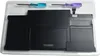 A laptop battery and two screwdrivers are laid out in a clear plastic tray. Produktbild-Vorschau