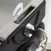 A close-up view of a lock mechanism with a key inserted. Podgląd zdjęcia produktu