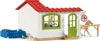 A toy veterinary clinic playset with a horse, dog, and a person inside. Podgląd zdjęcia produktu