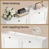 A split image showing the top of a white shoe cabinet with decorative items and a close-up of an anti-toppling device. Náhľad obrázku produktu