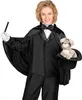 A young boy dressed as a magician, holding a wand and a top hat with a rabbit inside. Produktbild-Vorschau