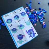 An instruction manual for a building block set, with scattered building blocks on a black surface. Produktbild-Vorschau