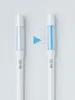 Two identical white pens with clear cylindrical sections, one showing a light blue liquid and the other empty, with a blue triangle arrow between them indicating a change or process. Produktbild-Vorschau