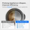 A split image showing the inside of a kettle, with one side heavily stained and the other side clean, illustrating the benefits of using filtered water. Produktbild-Vorschau