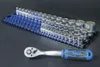 A set of socket wrenches and a ratchet on a black surface. Náhled obrázku produktu
